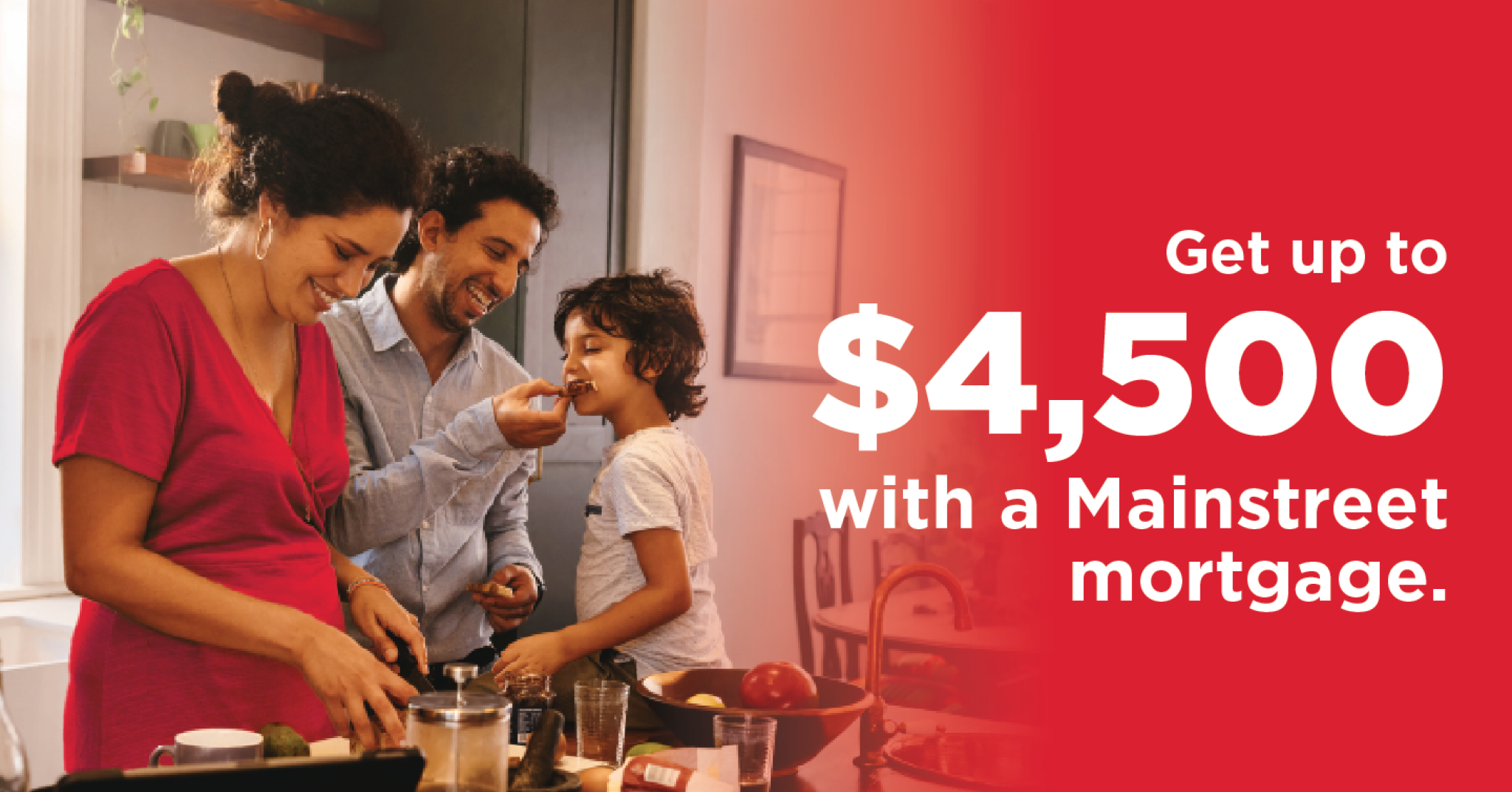 Family cooking together in a kitchen, smiling as parents help a child prepare food. Overlaid text reads: &lsquo;Get up to $4,500 with a Mainstreet mortgage.'.